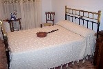 CAMA ANTIGUA CON CALENTADOR